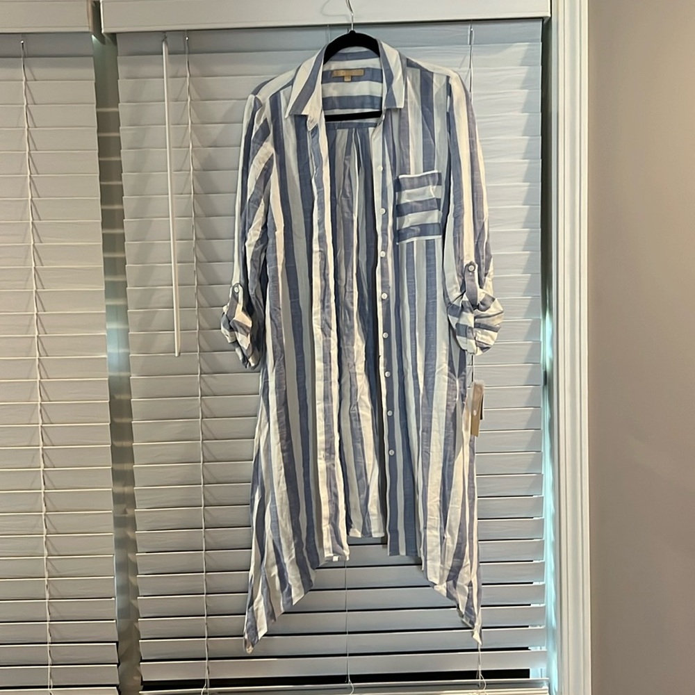 Never worn. Doesn’t fit